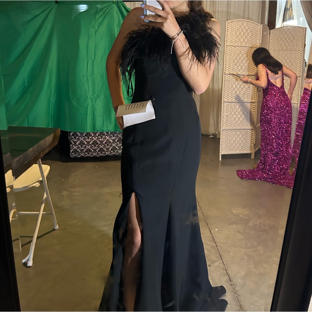 Prom dress! I bought “second hand but never worn by either!) so brand new Size 2